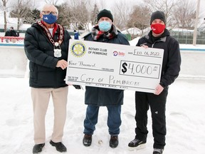 The Rotary Club of Pembroke donated $4,000 to the City of Pembroke to cover costs of operating the skating rinks at Rotary Park. On hand for the presentation (from left) were Pembroke Mayor Mike LeMay, Rotary Club president David Foohey and Rotarian Shawn Gillies who co-ordinates the volunteers who oversee the rink.