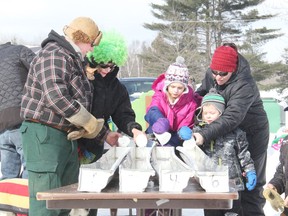 And they're off! Minnow racing was a popular activity at the Laurentian Valley Winter Fun Day held at the Alice and Fraser Rec Centre on Feb. 19. In the photo from left, Dale Flieler (and Willow whose head is poking out of his coat), Winona Hunter, Xavia Mask, Arthur Mask and Sheena Mask. Anthony Dixon