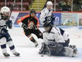 Woodstock goalie Keaghan Brett makes a save Friday against Burford. Brett finished with 27 stops for his second shutout of the season in a 12-0 victory.