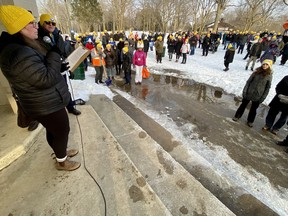 Joanna Parker, Stratford-Perth Shelterlink executive director, addresses nearly 400 walkers who participated in the local Coldest Night of the Year event that had raised more than $160,000 as of late Saturday afternoon.