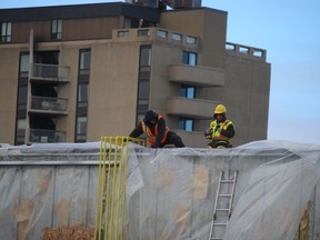 Construction on the roof of the building housing the Shared Services Centre in downtown Sarnia is shown in this file photo.