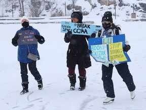 Participants take part in a Skate-In on the Ramsey Lake skating path in Sudbury, Ont. on Tuesday February 1, 2022. A coalition opposed to cuts at the university held a series of events on Tuesday, including the Skate-In, to ruefully mark a year since the university went down its restructuring path. Skaters held banners as they skated to protest LaurentianÕs choice to adopt CCAA as a means of restructuring in the face of its insolvency. John Lappa/Sudbury Star/Postmedia Network