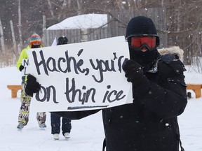 Former Laurentian University professor Thierry Bissonnette takes part in a Skate-In on the Ramsey Lake skating path in Sudbury, Ont. on Tuesday February 1, 2022. A coalition opposed to cuts at the university held a series of events on Tuesday, including the Skate-In, to ruefully mark a year since the university went down its restructuring path. Skaters held banners as they skated to protest LaurentianÕs choice to adopt CCAA as a means of restructuring in the face of its insolvency. John Lappa/Sudbury Star/Postmedia Network