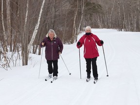 Christine Dubeau, left, and Jo-Anne Dupuis ski on one of the trails at the Capreol Cross-Country Ski Club in Capreol, Ont. on Wednesday February 2, 2022. John Lappa/Sudbury Star/Postmedia Network