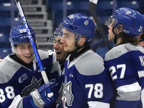 Players from the Sudbury Wolves celebrate a goal against the Niagara IceDogs during OHL action at the Sudbury Community Arena in Sudbury, Ont. on Friday February 11, 2022. John Lappa/Sudbury Star/Postmedia Network