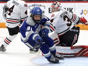 Evan Konyen, of the Sudbury Wolves, chases down the puck during OHL action against the Niagara IceDogs at the Sudbury Community Arena in Sudbury, Ont. on Friday February 11, 2022. John Lappa/Sudbury Star/Postmedia Network