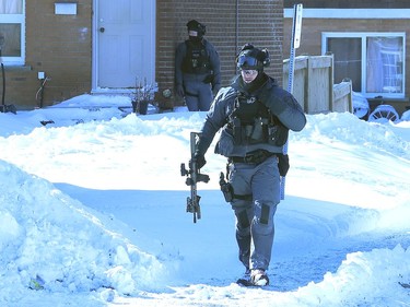 There was a heavy police presence at Ryan Heights in Sudbury, Ont. on Friday February 25, 2022. Greater Sudbury Police said in a Tweet that "multiple people are in custody. Scene will be held so that detectives can conduct search warrant of residence." John Lappa/Sudbury Star/Postmedia Network