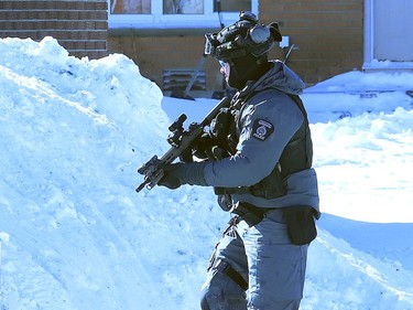 There was a heavy police presence at Ryan Heights in Sudbury, Ont. on Friday February 25, 2022. Greater Sudbury Police said in a Tweet that "multiple people are in custody. Scene will be held so that detectives can conduct search warrant of residence." John Lappa/Sudbury Star/Postmedia Network