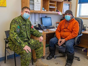 Lt.-Col. Shane McArthur, who commands the Canadian Rangers across the Far North of Ontario, discusses the pandemic situation in Attawapiskat with Chief David Nakogee.

Supplied/Lt. Camilo Olea-Ortega