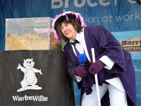 South Bruce Peninsula Mayor Janice Jackson leans in for Wiarton Willie’s annual prediction on Feb. 2 in Wiarton.