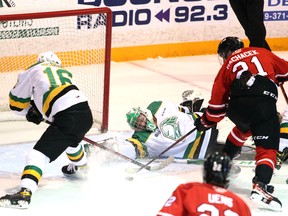Down-and-out, Brett Brochu reaches back but not in time to stop Stepan Machacek from potting a first period goal on the power play as the Owen Sound Attack host the London Knights inside the Harry Lumley Bayshore Community Centre Sunday, Feb. 6, 2022. Greg Cowan/The Sun Times