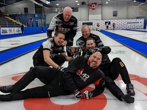 Team Howard celebrates winning the Port Elgin '22 Ontario Tankard Sunday afternoon at the Plex. Back, coach Glenn Howard; middle left to right, David Mathers, Scott Howard, Tim March;  front, Adam Spencer. Greg Cowan/The Sun Times