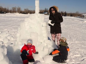 Samantha Ayles and her kids Ivory, five, and Rylee, seven, helped build an igloo during Family Day festivities at Rotary Park.