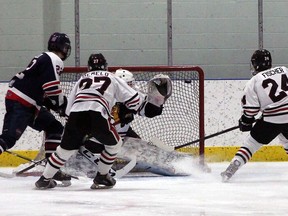 Icemen Connor MacLeod tied the game in the first period against the Beverly Warriors Sunday.