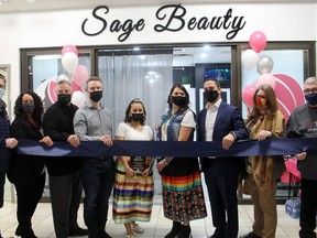 Members of the Leduc, Nisku and Wetaskiwin Regional Chamber of Commerce (left) and Wetaskiwin City Council (right) joined Sage owner/operator Danielle Baptiste (centre right) and Zena Okeymow in cutting the ribbon on Baptiste's new business, Sage Beauty in the Wetaskiwin Mall last week.
Christina Max