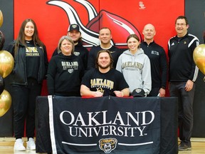 Northern Vikings thrower Blake Foster of Sarnia, Ont., is joined by relatives and coaches for his signing ceremony with the Oakland University track and field team. (Contributed Photo)