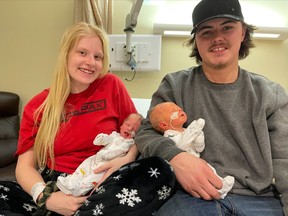 Brenda Periard-Hamilton and Austin Dreher hold their newborn sons, Kayce and Maverick Dreher, at North Bay Regional Health Centre, Tuesday. The twins were born on Twosday, Feb. 2, 2022  22/2/22. Submitted Photo