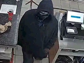 Police are looking for an individual, pictured here in security footage, who robbed a Falconbridge Road convenience store on Jan. 24.