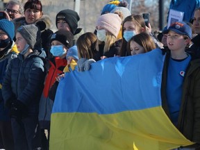 Staff and students of St. Theresa Catholic School joined Strathcona County for a special flag raising ceremony in support of Ukraine at Volunteer Square on Friday, Feb. 25. Lindsay Morey/News Staff