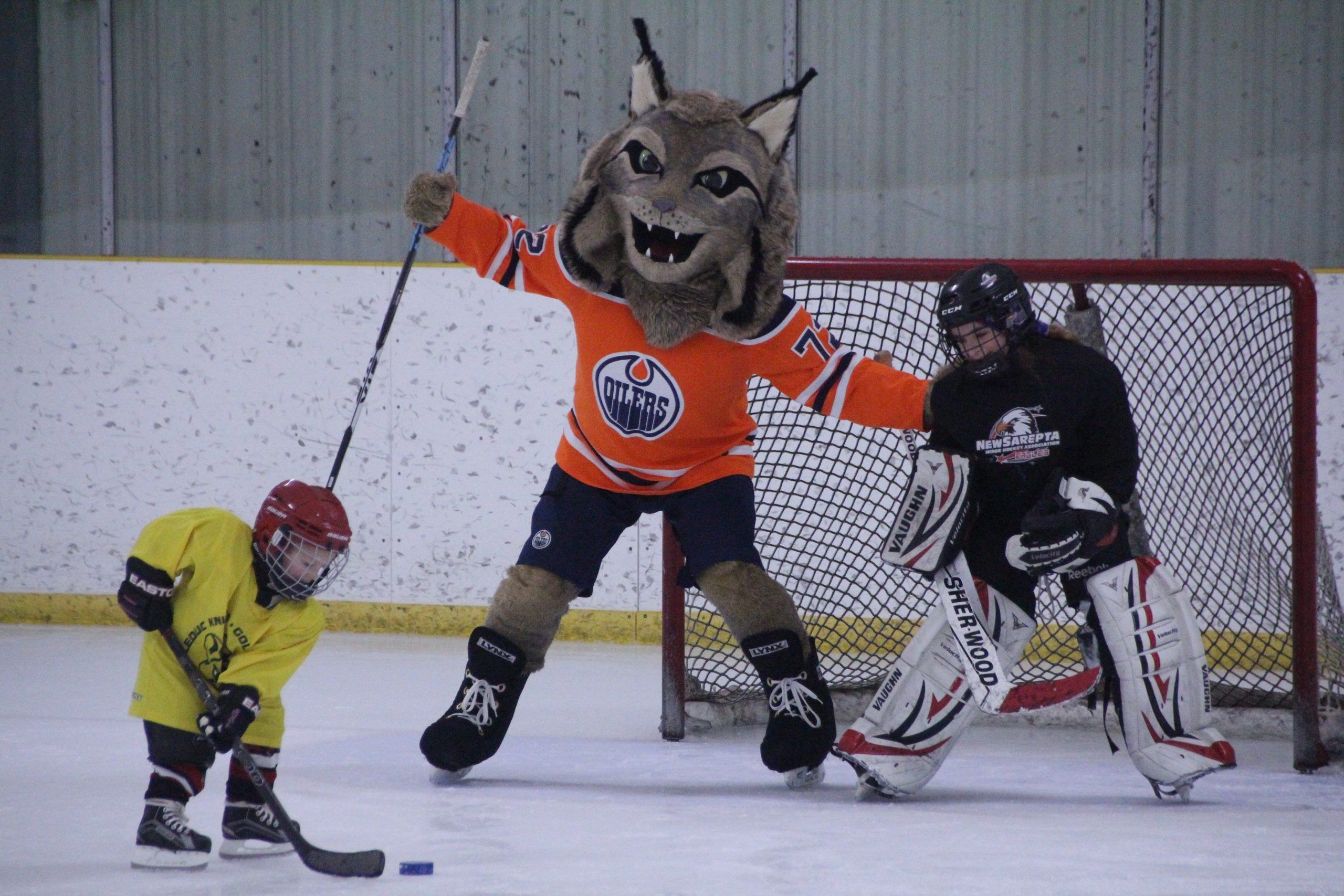 Youngsters introduced to hockey at pair of New Sarepta events County