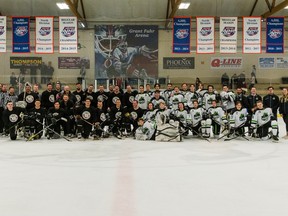 The Midget AA Pac Saints (white) defeated a team of local Parkland RCMP officers and SGFD firefighters (black) 5–4 during the first annual 'Battle for the Badges' charity hockey game at Grant Fuhr Arena on Saturday, Feb. 26. Photo by Korena Paradis Photography.
