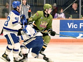 Cam Gauvreau of the North Bay Battalion, opposing David Goyette and Kocha Delic of the Sudbury Wolves, provided two assists in the Troops' 9-2 Ontario Hockey League win Thursday night. The Kingston Frontenacs visit Memorial Gardens on Sunday.
Sean Ryan Photo