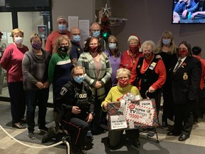 The Kinette Club of Belleville gather alongside other members of the community after raising $35,000 from the sale of Peterborough Kinsmen TV Bingo tickets. Submitted.