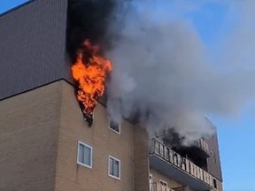 A fire broke out at an apartment building on Lisgar Avenue in Tillsonburg on Tuesday morning. OPP VIDEO/TWITTER