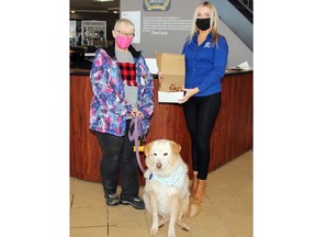 Lea Thompson and her sidekick Foster delivered cupcakes made by Debbie’s Desserts to Petawawa Toyota on Feb. 28 as part of National Cupcake Day for the Ontario SPCA and Humane Societies. Receiving the delicious delivery was Amanda Gunter, appointment co-ordinator at Toyota.