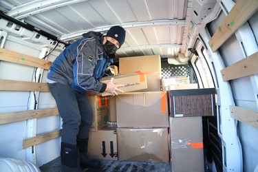 Justin Todd loads boxes into a van at the Ukrainian National Federation hall in Sudbury, Ont. on Thursday March 10, 2022. Medical and other supplies are being delivered to Toronto, and then shipped overseas to support Ukrainians. John Lappa/Sudbury Star/Postmedia Network