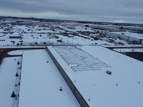 The solar panels on the roof of the Amazon DYB2 delivery station in Nisku, March 7. It’s the first Amazon building in Canada to be solar-paneled, with the power generated offsetting 35% of the building’s energy consumption. The roof was completed in December of 2021, and is currently in use generating power. (Avinash Karedla)