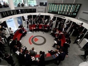 Traders work on the floor of the London Metal Exchange in London, Britain, September 27, 2018. REUTERS/Simon Dawson//File Photo