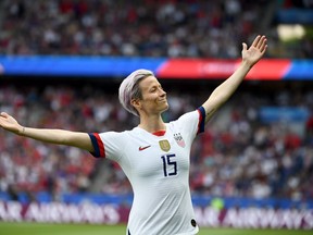 Megan Anna Rapinoe, along with 27 of her US Women's soccer teammates, filed a lawsuit in 2019 against the United States Soccer Federation accusing it of gender discrimination,  hoping to achieve equal pay. FRANCK FIFE/AFP via Getty Images