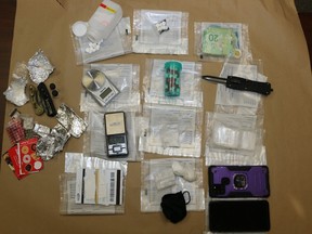 Two people are facing charges after police seized a quanity of illicit drugs and a weapon from a Kent Street, Simcoe address on Thursday, March 10. NORFOLK OPP PHOTO