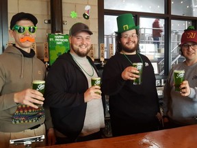 Shown from left are Sons of Kent Brewing Co. staff members Trent Scaman, C.J. Church, Will Shepherd and Ian Scott. The Chatham brewery is planning a three-day St. Patrick's celebration to make up for lost time during the pandemic. (Trevor Terfloth/The Daily News)