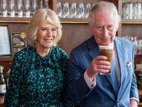 Prince Charles hoists a pint of Guinness he just had poured during a visit he and Camilla, Duchess of Cornwall, made this week to The Irish Cultural Centre in London. Wonder if the Prince of Wales is aware of the two Patricks? Arthur Edwards/WPA Pool/Getty Images