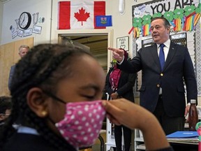 Premier Jason Kenney visited a classroom at Aurora Academic Charter School in Edmonton on Tuesday, March 15, where he announced the Alberta government is investing $25-million in operating funding and $47-million in capital investment over the next three years to support  charter school expansions and collegiate programs in the education system as part of Budget 2022. LARRY WONG/Postmedia Network