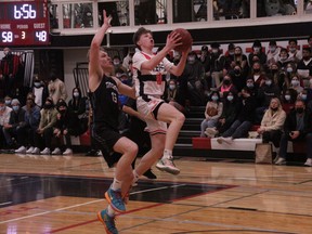 Kohl Wedman goes up for a layup in Leduc Composite’s 108-104 overtime home loss to Harry Ainlay, February 23. (Dillon Giancola)