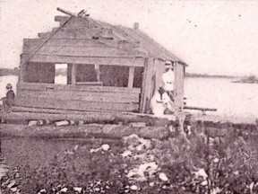 A turn-of-the-century photo on Wildman’s Island shows a fish house and net drying reel, probably that of the Belmores. The Wild Man declined Frank Belmore’s invitation to drop in for a meal. [Bruce County Museum & Cultural Centre, A2016.001.084.]