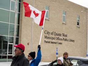 Protestors demonstrate in front of Quinte West city hall in opposition to public health mandates to protect citizens from COVID-19. Feb. 9 in Trenton, Ontario. ALEX FILIPE