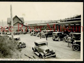 •	FO44.002.103 – People and vehicles awaiting detraining of Lord and Lady Tweedsmuir and vice-regal party at Peace River NAR Station August 15, 1939.  They were on a tour of the Peace Country.
