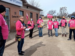 Michael Hurley, the president of CUPE's Ontario Council of Hospital Unions, and Treena Hollingworth, president of CUPE Local 4727, which represents roughly 500 Huron-Perth Healthcare Alliance employees, spoke at a rally for the repeal of Bill 124 in front of Perth-Wellington MPP Randy Pettapiece's Stratford office Tuesday morning.  (Galen Simmons/The Beacon Herald)