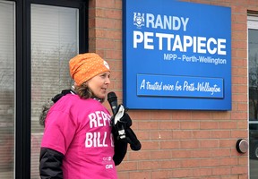 Jo-Dee Burbach, the Ontario NDP's Perth-Wellington candidate in the upcoming provincial election, spoke in support of repealing Bill 124, Ontario's Protecting a Sustainable Public Sector for Future Generations Act, at a CUPE rally with local health-care workers in front of Perth-Wellington MPP Randy Pettapiece's Stratford office Tuesday morning.  (Galen Simmons/The Beacon Herald)