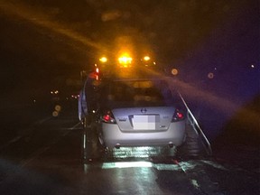 A vehicle is towed after being pulled over for speeding on Highway 69 on Saturday night.