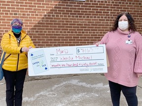 Wendy Michael, left, won the week 33 weekly prize in the Pembroke Reigonal Hospital Foundation's Catch the Ace 3.0 online fundraiser. Presenting the $7,163 cheque is PRHF community fundraising specialist Leigh Costello. Submitted photo