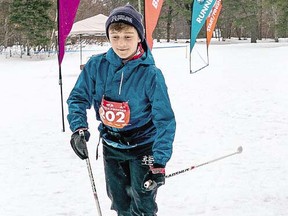 Jasper Tchir, 12, and Cole Teresinski, 11, prepare for their 10-kilometre ski at the Beaver Freezer Marathon at Hiawatha Highland’s  Kinsmen Park. BOB DAVIES