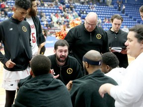 Sudbury Five head coach Elliott Etherington speaks to his players during a break in NBLC action against the KW Titans at Sudbury Community Arena in Sudbury, Ontario on Saturday, March 26, 2022.
