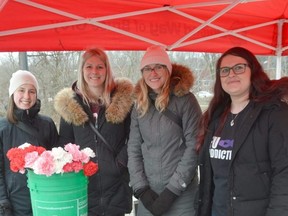 The We Will Remember Them opioid overdose awareness event was held at the Owen Sound Farmers' Market in Owen Sound on Saturday, March 26, 2022. From left are Grey Bruce Health Unit Public Health Nurse Heidi Lucas, Michelle Parkes of Safe 'n Sound, GBHU Public Health Nurse Kelsey Walker and Gelja Sheardown, who lost her husband Barrett Warwick to a fentanyl overdose.