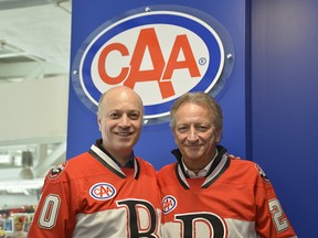 Belleville Mayor Mitch Panciuk poses alongside the late Eugene Melnyk, owner of the Ottawa and Belleville Senators hockey teams, who passed away Monday night following an illness. Submitted.