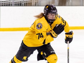 Carley Olivier of the Waterloo Warriors takes part in OUA women's hockey action against the Windsor Lancers at Columbia Icefield in Waterloo, Ont. on Saturday, November 26, 2021.